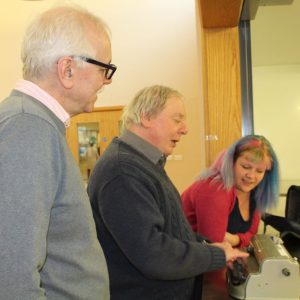 Image shows a Braille machine being used at the Communication Class