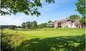 Blackmoor Golf Club house surrounded by grass