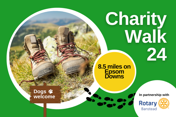 Image shows a pair of walking boots on a hill with the words Charity Walk24 and 8.5miles on Epsom Downs.