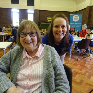 Image shows Katherine Scanlan, Senior Community Engagement Officer with a Meet Up Catch Up attendee.