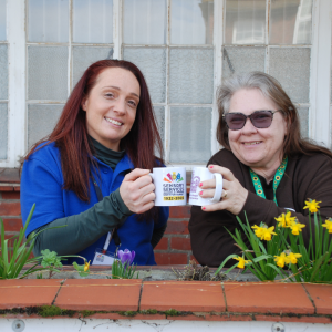 Image shows Natalie, Community Engagement Co-ordinator with Yola, an attendee to Meet Up Catch Up.