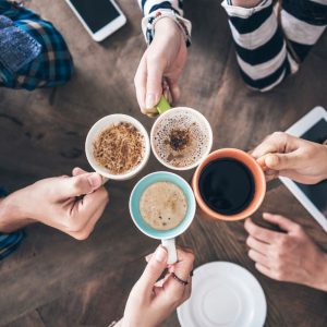A collection of coffee cups are clustered together
