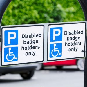 A disabled parking sign