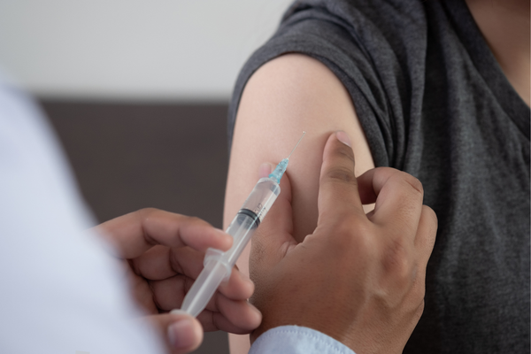 An injection is about to be administered.