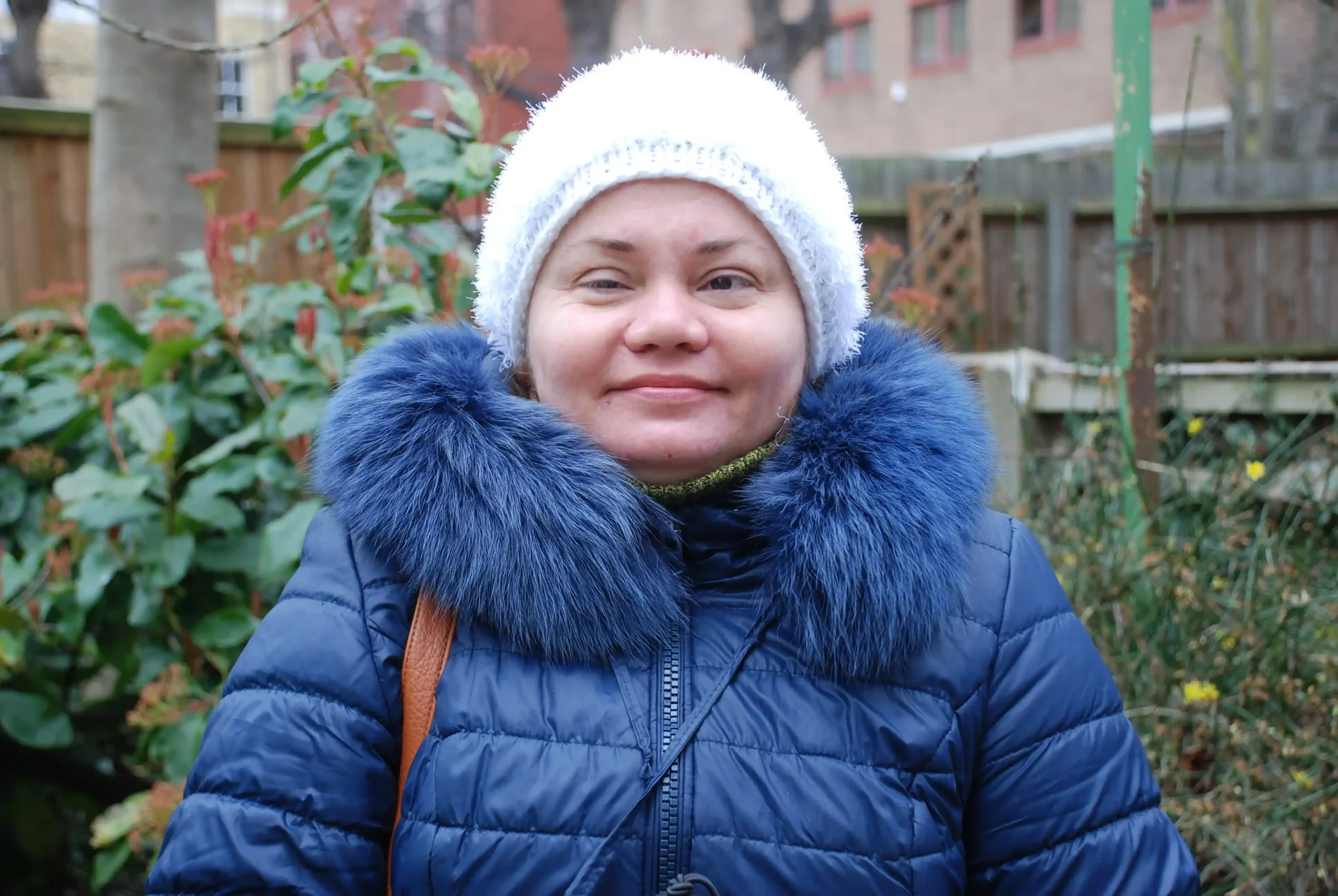 A vision impaired lady supported by the charity