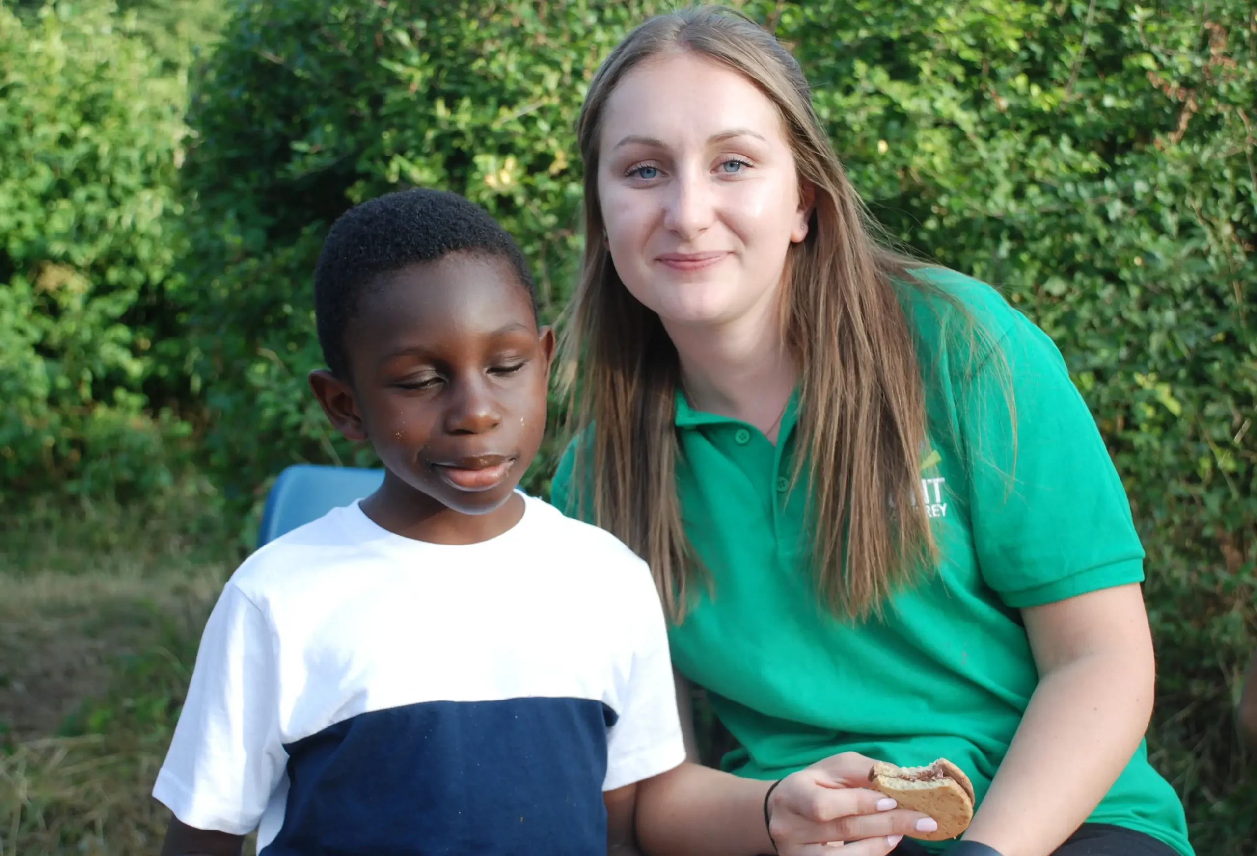 A member of staff with a young person we support