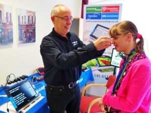 A person is trying one some equipment 