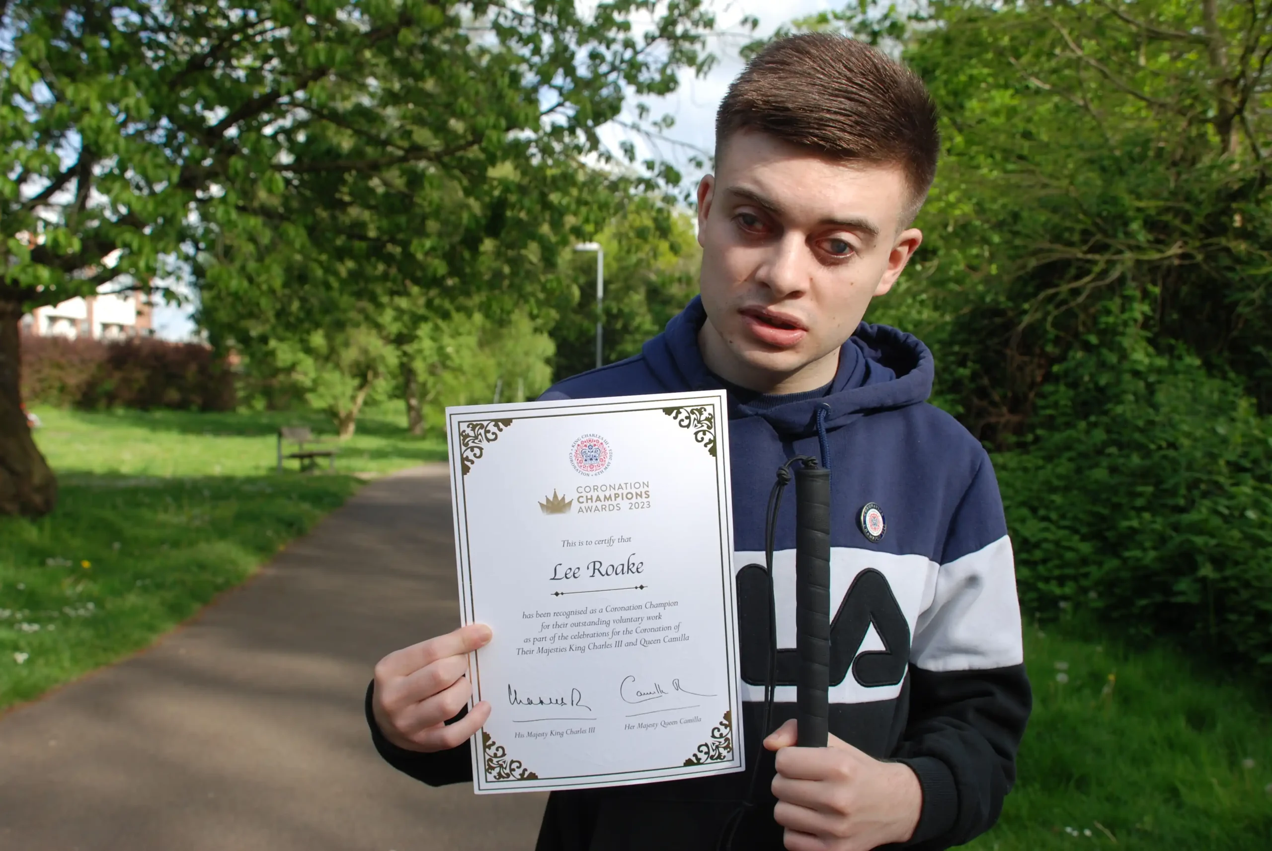 Lee with his Coronation Champions Awards certificate