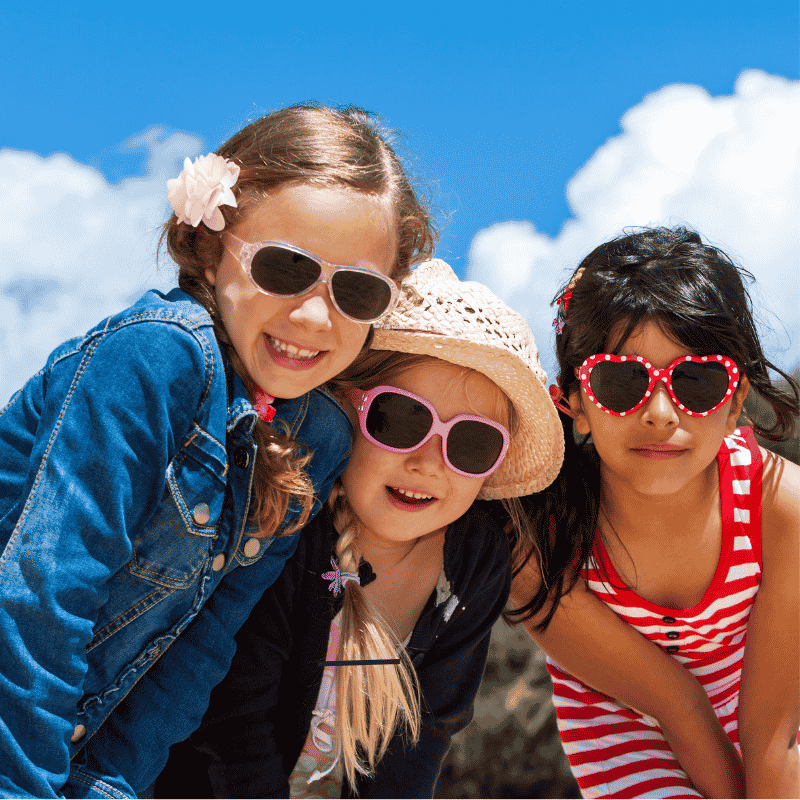 Three children wearing sunglasses