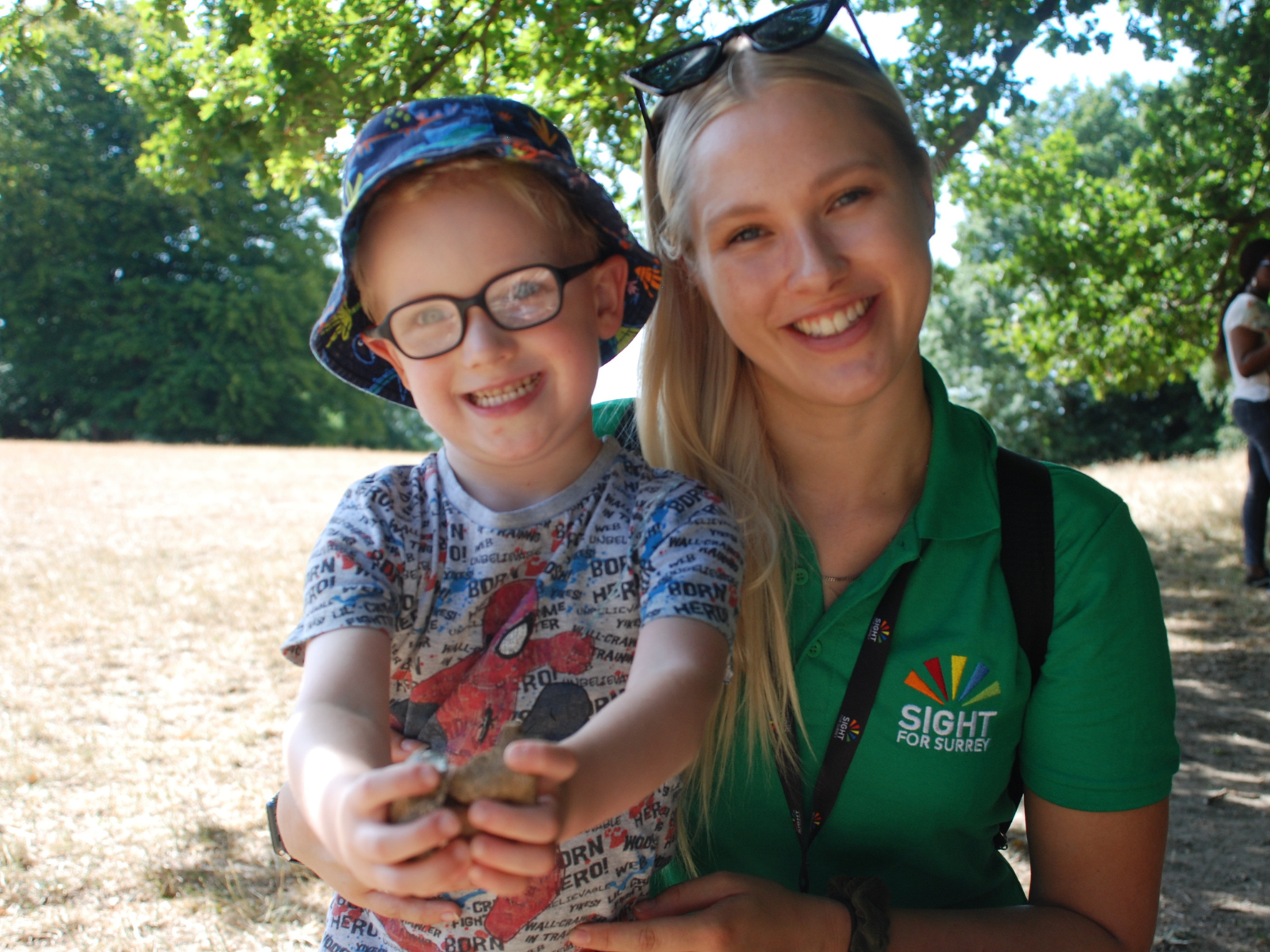 Sharn, Habilitation Specialist, with a child the charity supports.